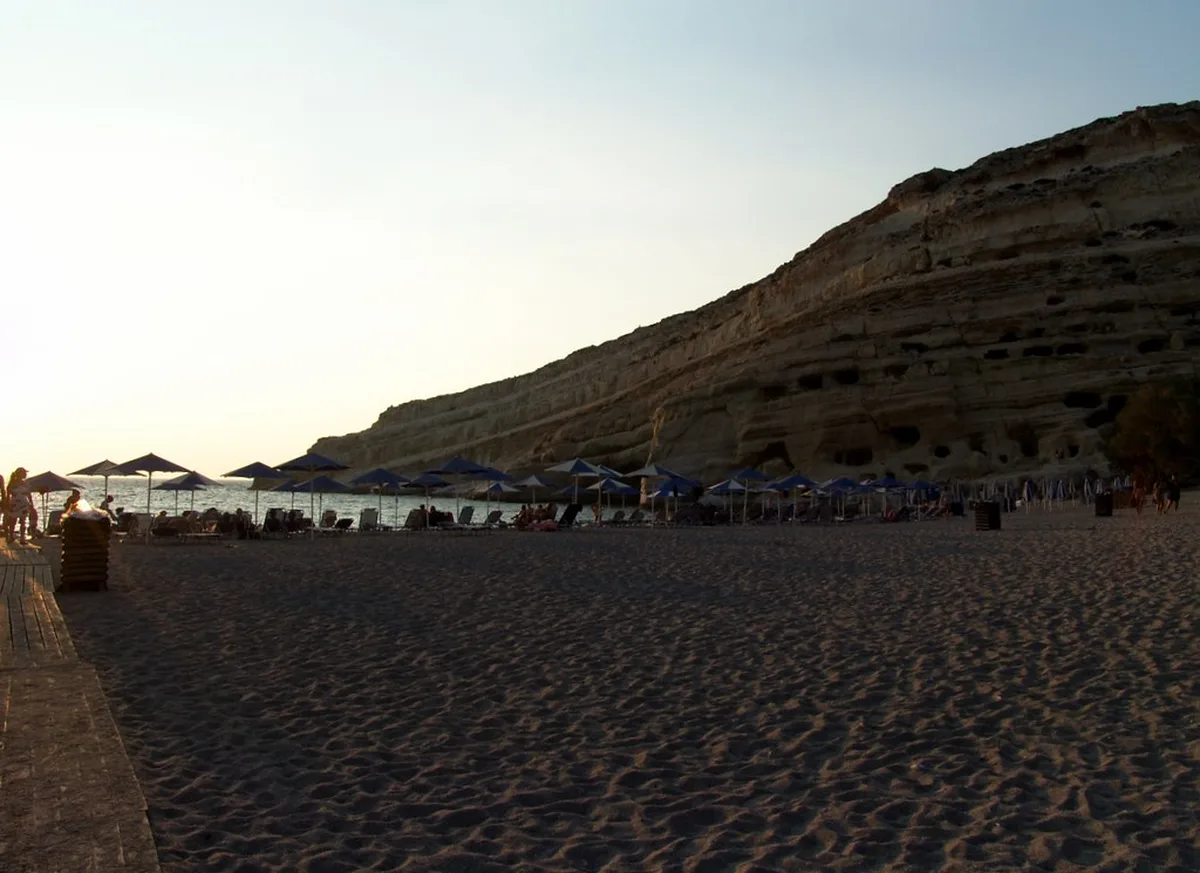 Matala The Famous Hippie Beach with Sea Caves Day Trip from Heraklion in Iraklio